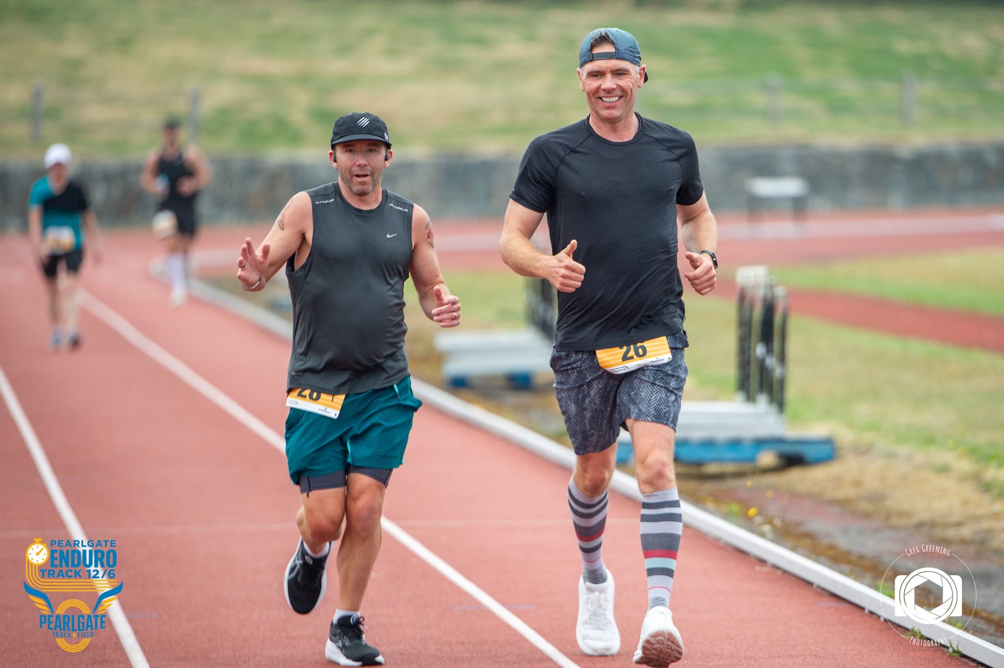 Two athletes running side by side during the Enduro Challenge