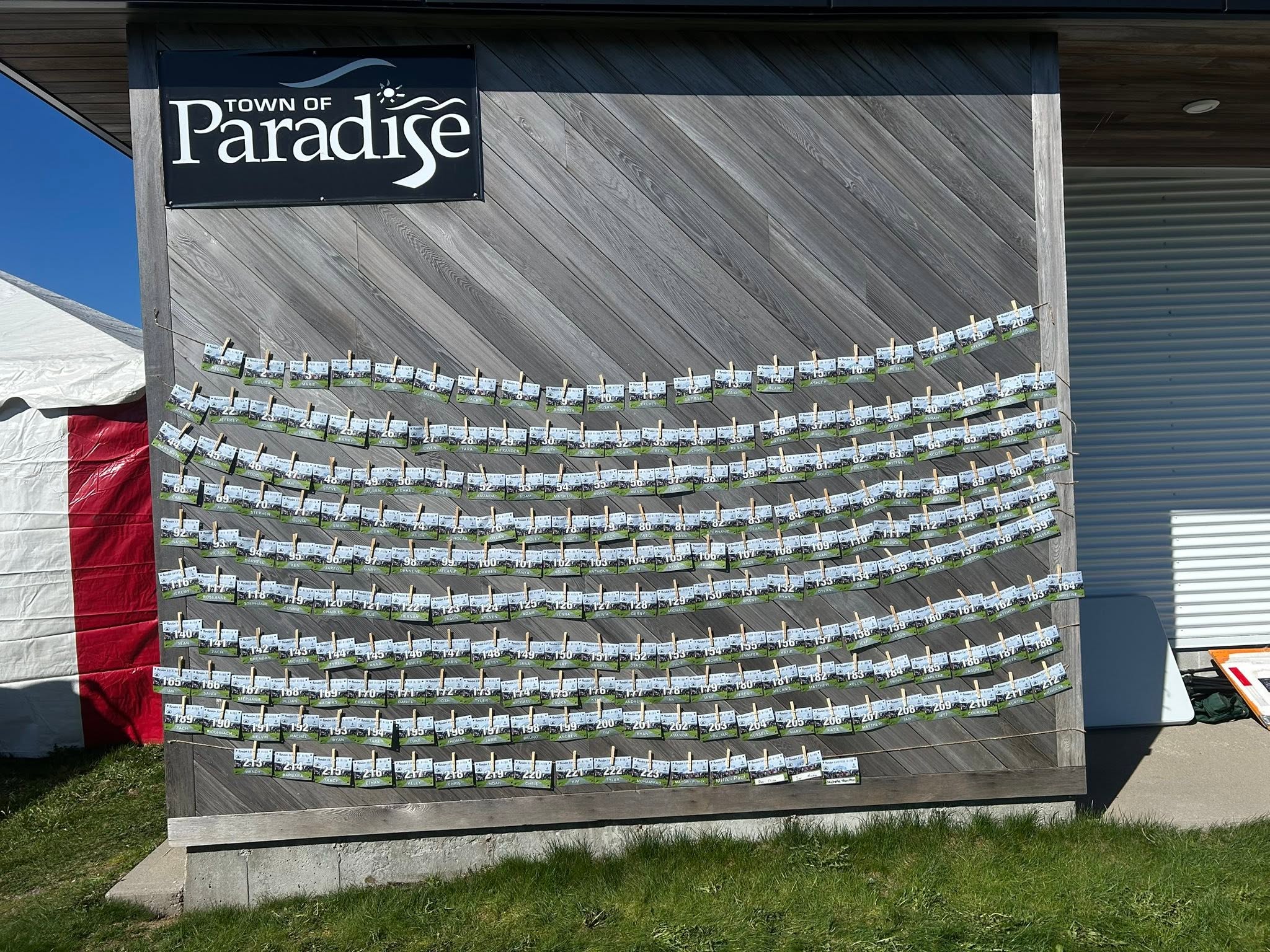 The event runner wall displaying participant names